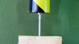 Crushing a Bolt into Wood with a Hydraulic Press