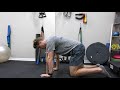 NECK/UPPER BACK FIX: BANDED CHIN TUCKS