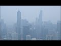 Time-lapse shows haze from wildfire smoke emerge in Chicago