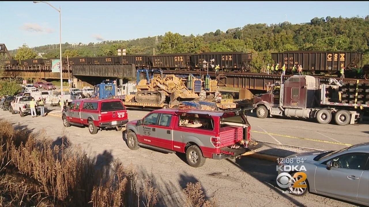 Crews Continue Clean-Up After Train Derailment - YouTube