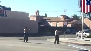 Police shooting video shows LA cops kill armed black man Nicholas Robertson - TomoNews
