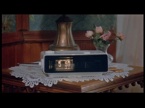 What does the alarm clock say in Groundhog Day?