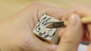 Traditional Chinese seal-cutting technique to create a unique rabbit seal