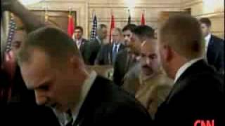 Iraqi journalist hurls shoes at President Bush!