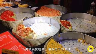 北京快餐店的铁板炒饭，卖14元一份，所有食材先蒸后炒，量大实惠，女生一份吃不完