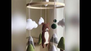 Woodland baby mobile with bear and mountains. Forest decor for crib.