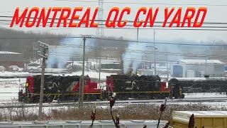 1 7 22 SNOWY RAILROAD SCENE AT MONTREAL QUEBEC CN TRAIN YARD