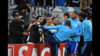 Marseille player Patrice Evra was sent off after kicking