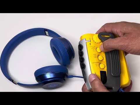 Where do the batteries go in a Sony Sports Walkman?
