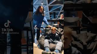 Her Sits On Kids Head