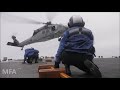 refueling a huge combat ship . burke class destroyer uss paul hamilton . underway replenishment