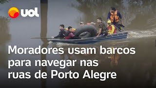 Enchentes no Rio Grande do Sul: Moradores navegam pelas ruas inundadas de Porto Alegre; veja vídeo