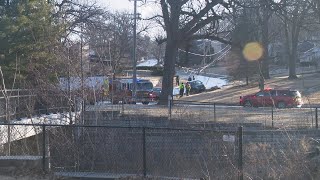 Scene video: Des Moines ambulance hits vehicle as it slides on icy road while responding to crash