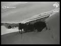 SWITZERLAND: Travellers passing through Swiss Alps in horse and cart (1929)