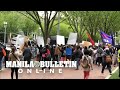 Protestors assemble outside the White House as PresidentMarcos meets US President Biden