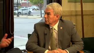 Register managing editor Matt Westerhold talks with Sen. Randy Gardner during a segment of \