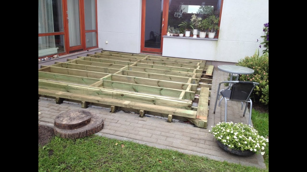 How To Build A Ground Level Deck - Frame - ( Part 1) - YouTube