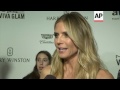 Theron, Klum, Hamm attend star-studded amfAR gala