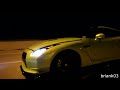 glowing red brakes on a nissan gt r racing a procharged gs vette hd