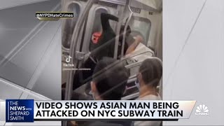Video shows Asian man attacked on N.Y.C. subway train