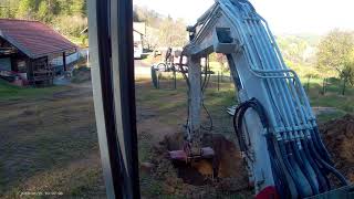 Takeuchi tb145 digging a hole