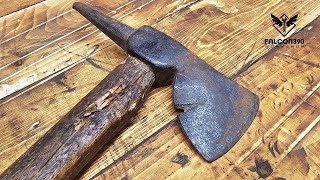 Unique axe restoration with fancy handle.