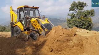 Road Connecting Remote Hilly to City-Part 1-Backhoe Loader Removing Dirt after Excavators