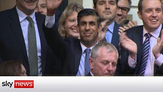 Rishi Sunak arrives to cheers at Conservative Party HQ