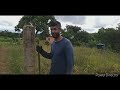 testando perfurador de solo no cascalho com pedra fazendo cercado pros gado