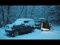 blizzard car camping in a snow storm