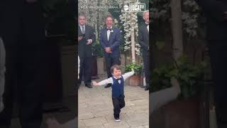 Boy runs down aisle to greet mom at wedding