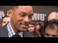 will smith slaps kissing reporter raw video