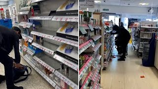 Angry customer confronts shoplifter stealing from Boots