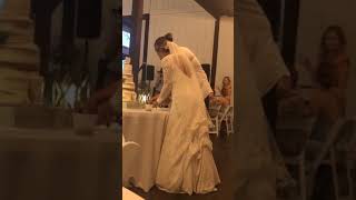 Groom gets his bride back for smashing cake in his face.