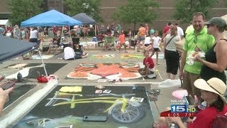 Artists draw on sidewalks