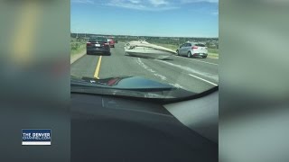 Traffic fight caught on camera ends with boat on C470