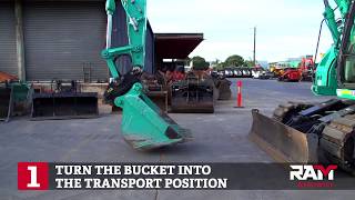 Unhitching a double lock quick hitch (12T-14T Excavators and above)