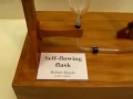 Self flowing flask