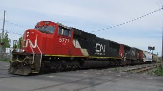 2 CN LOCOS HAULING 2 CARS IN ST LAMBERT QC - 9-4-19