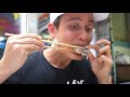 ancient thai street food 90 year old restaurant fish rice soup in bangkok thailand