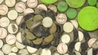 Venezuelan artist makes mural from bottlecaps