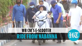 Watch: Mamata Banerjee rides e-scooter in protest against fuel price hike
