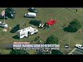 father of suspected georgia school shooter arrested on murder charges