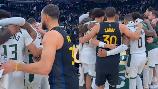 Steph Curry sneaks in and joins the Milwaukee Bucks prayer after the game