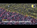 Drone footage shows thousands of bicycles abandoned in China as bike sharing reaches saturation