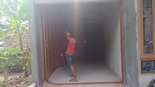 Pintu lipat besi sliding henderson