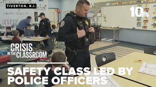 Police officers offers class to first graders to help prevent harm