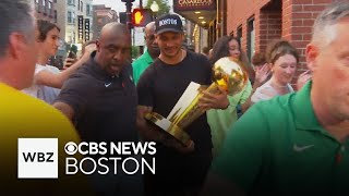 Celtics coach takes NBA championship trophy on tour of the North End