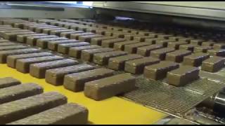 Wire Belt Company - Flat-Flex® conveyor belt - Thomas Tunnock Wafers chocolate enrobing