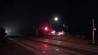 (Northbound) UP 7866 Manifest / Intermodal Train passes through the Titlow Beach Railroad Crossing.